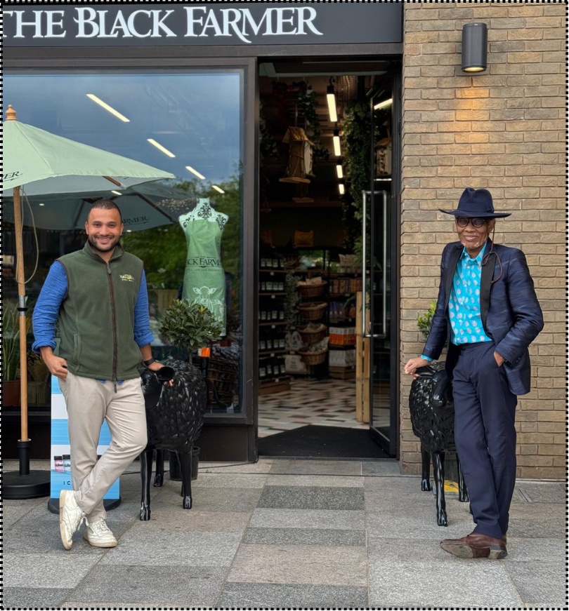 Alex and his dad outside The Black Farmer shop
